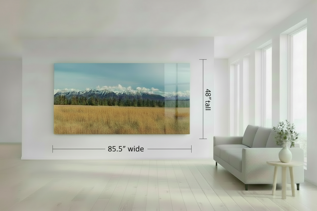 Living room with a large acrylic photograph displaying a scenic landscape, showing dimensions on the wall.